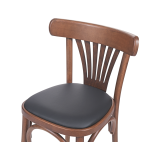 La silla de restaurante de madera LEGEND asiento de ecopiel negra